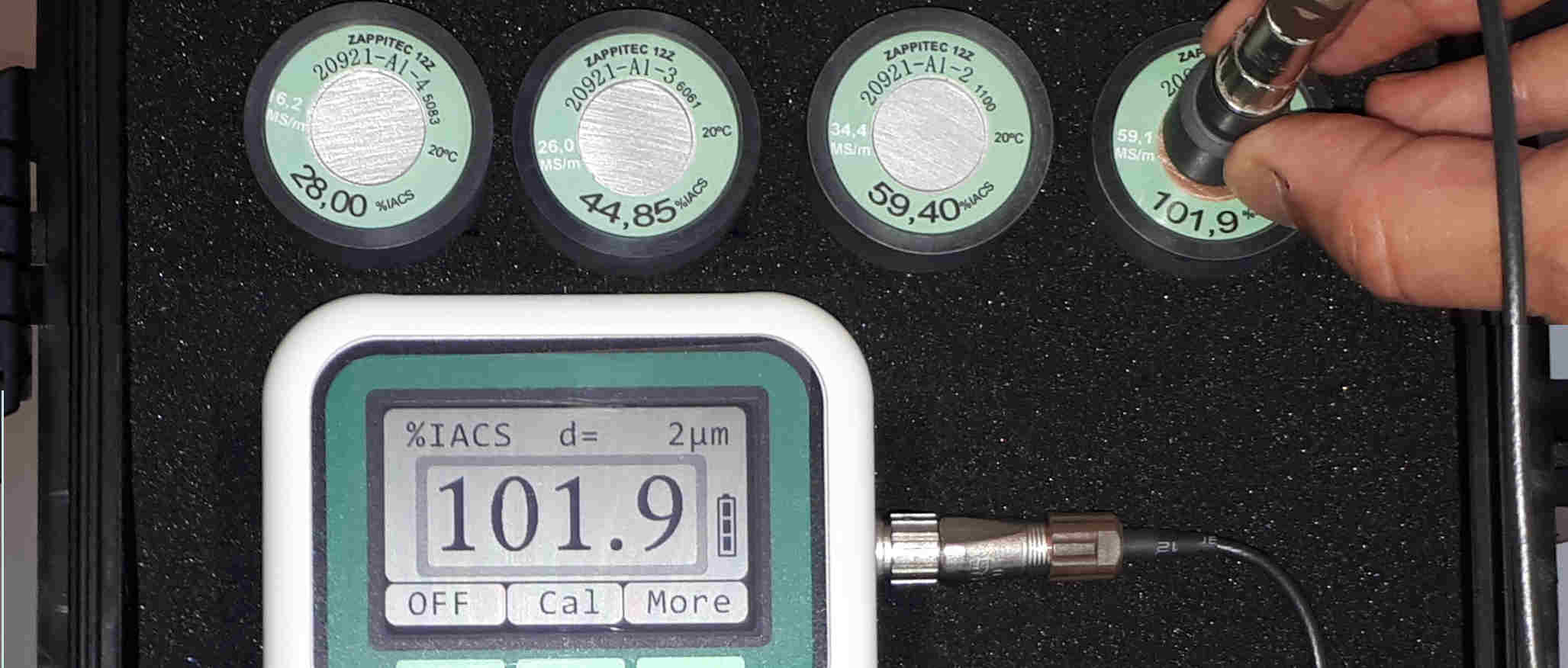 Series 1200 Conductivity Meter checking copper standard block